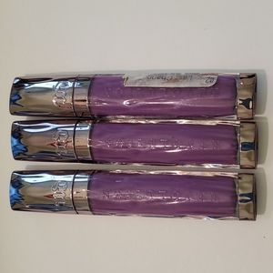 Urban Decay Revolution Lip Gloss "Bittersweet" $12/Each